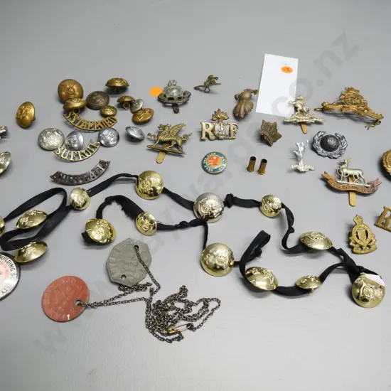 assorted military badges, buttons, regimental cap band shoulder badges, etc.