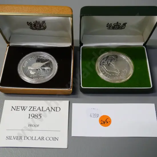 2 cased New Zealand cased proof dollar coins -  1980 fantail and 1985 black stilt
