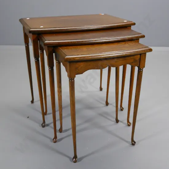 set of 3 oak cab-leg nesting tables, small reddish stain on smallest. Largest H-530 W-520 D-360