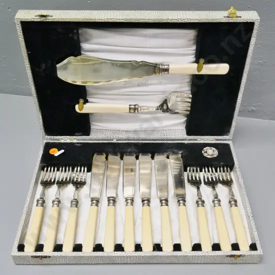 cased set of plated fish knives and forks with servers, faux ivory composite handles