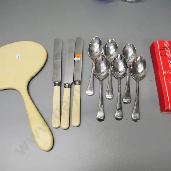 assorted plated ware - 6 spoons, 3 large bone-handled dinner knives - and a large faux ivory hand mirror
