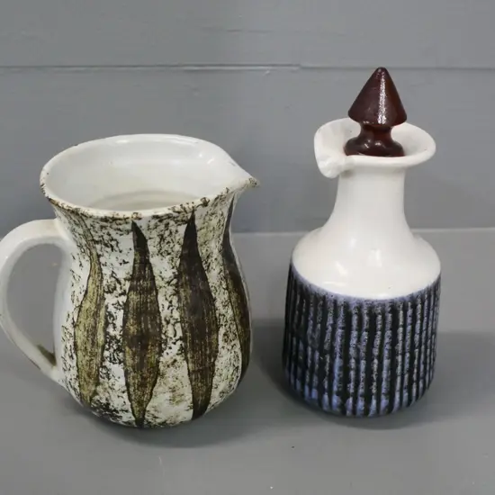 2 pieces of Hanmer pottery - jug and a stoppered sauce bottle H-155