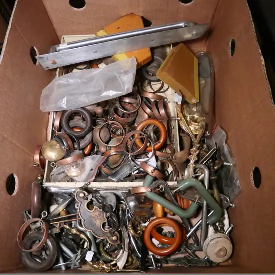 box of curtain hooks, cupboard handles, etc.