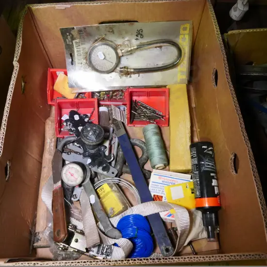 box of compression tester, drill bits, etc.