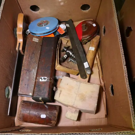 box of sharpening stones, mallet, saw, etc.
