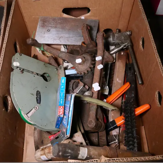 box of vintage car jacks, grease guns, wire brush, etc.