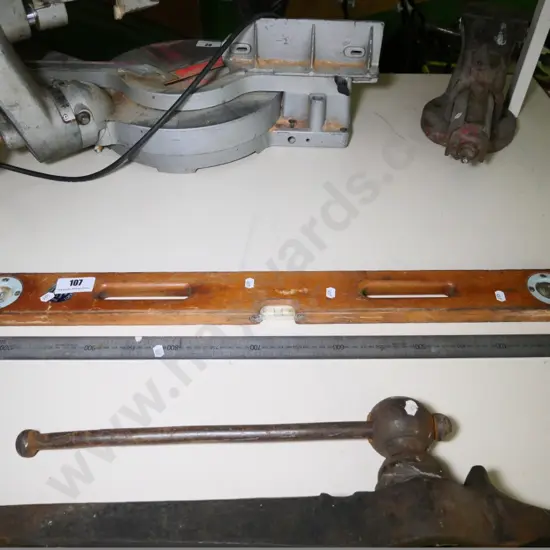 wooden level and a metal rule