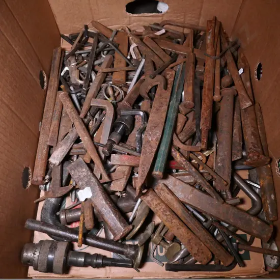 box of rusty cold chisels, allen keys, etc.