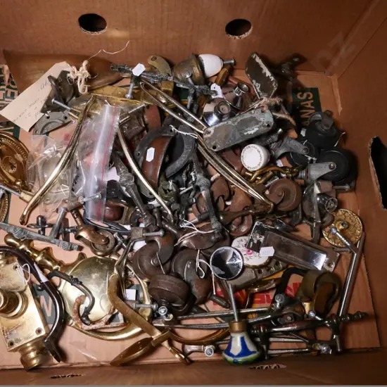 box of hardware - casters, cupboard handles, etc.