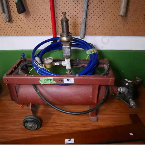 vintage gas bottle on casters