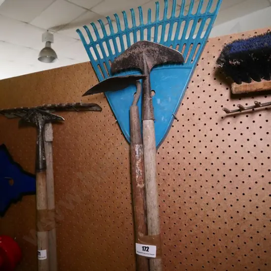 grass rake and 2 garden hoes