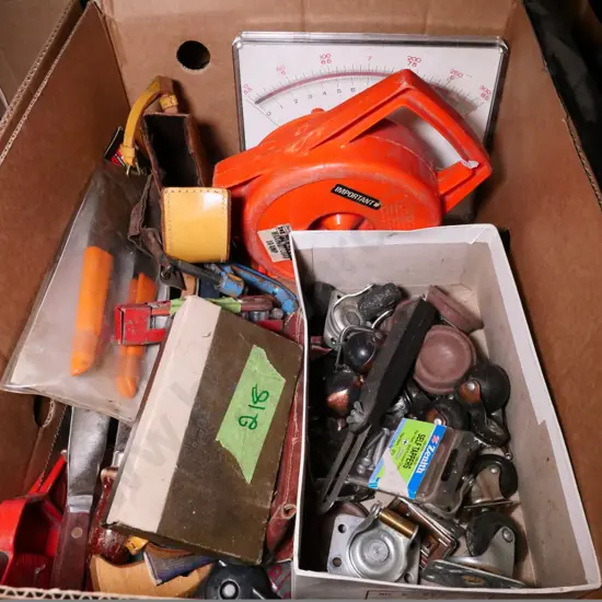 box of casters, hand tools, extension cord, etc.