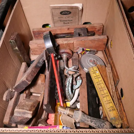 box of wooden rebate planes, rulers, tape measure, etc.