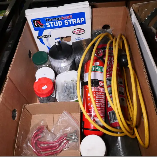 box of fire extinguishers, extension cord, stud strap, etc