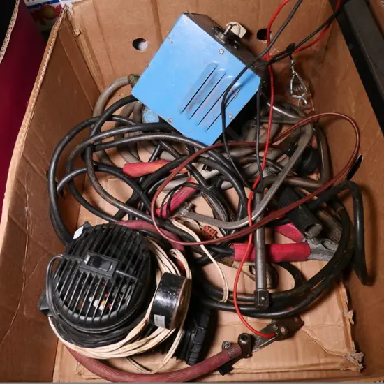 box of jumper leads, 12v pump, battery charger, etc.
