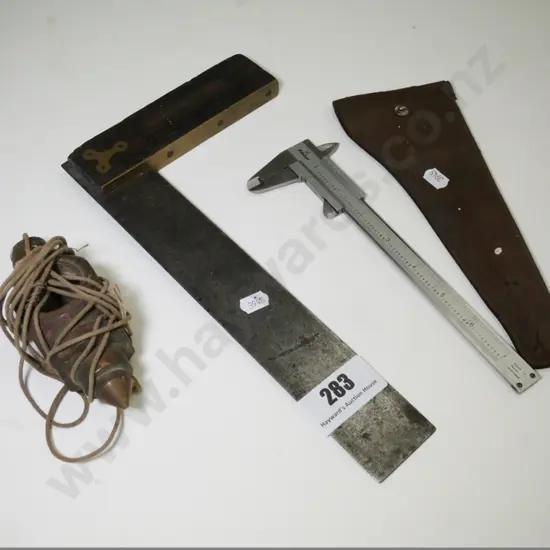 vintage plumb line, builder's square and micrometer