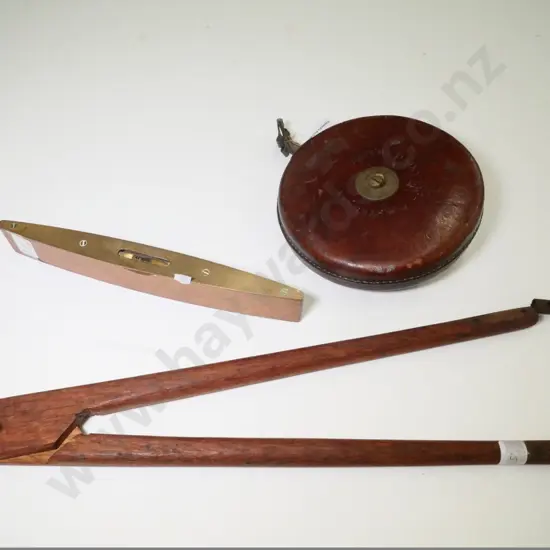 vintage leather cased builder's tape, wooden compass, small level