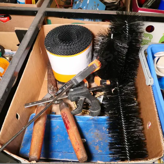 box of gutter guards, quick release clamps, part socket set, etc.