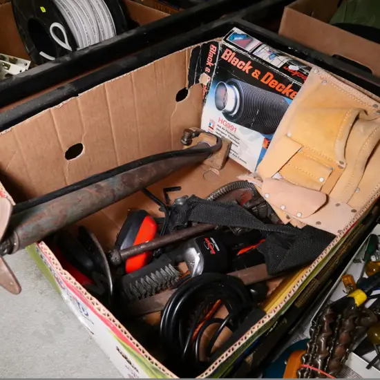 box of heat gun, hand drills, builder's pouch, etc.