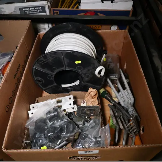 box of electrical cable, gardening tools, door hardware, etc.