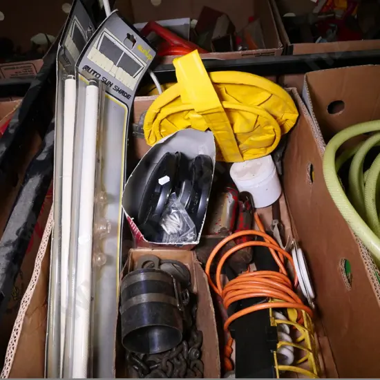 box of trouble light, bottle jack, valve puller, etc.