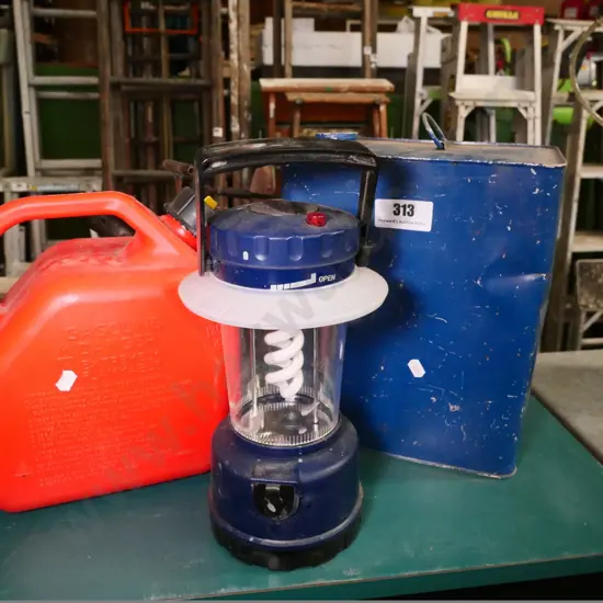 2 fuel containers and a camping light