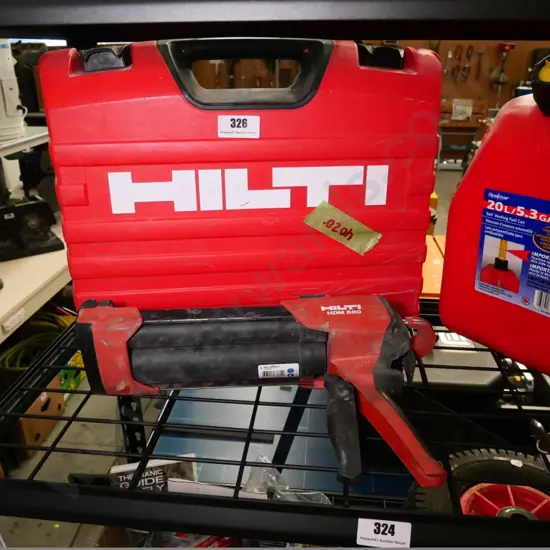 cased Hilti HDM500 caulking dispenser