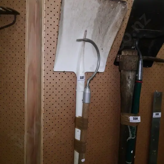wide-mouth shovel and a crook