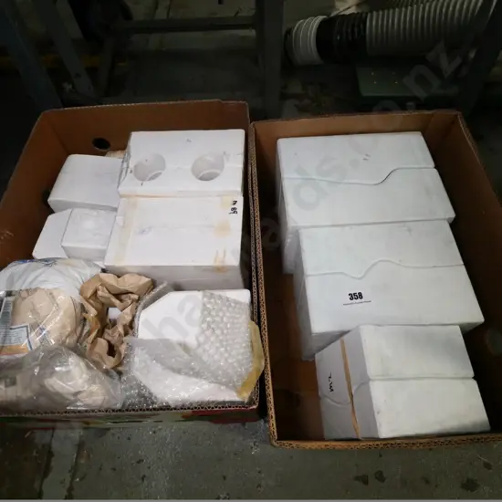 2 boxes of porcelain doll moulds