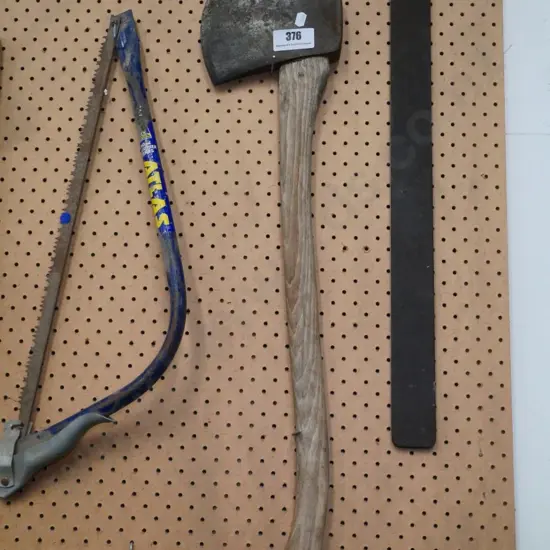 builder's square and an axe