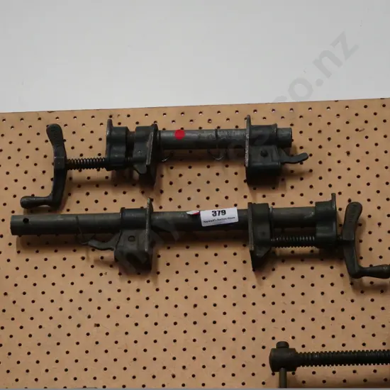 2 small pipe clamps - red dots