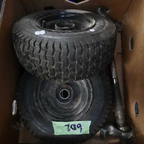 2 pneumatic tyres and an axle