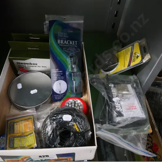 box of hunting and fishing accessories