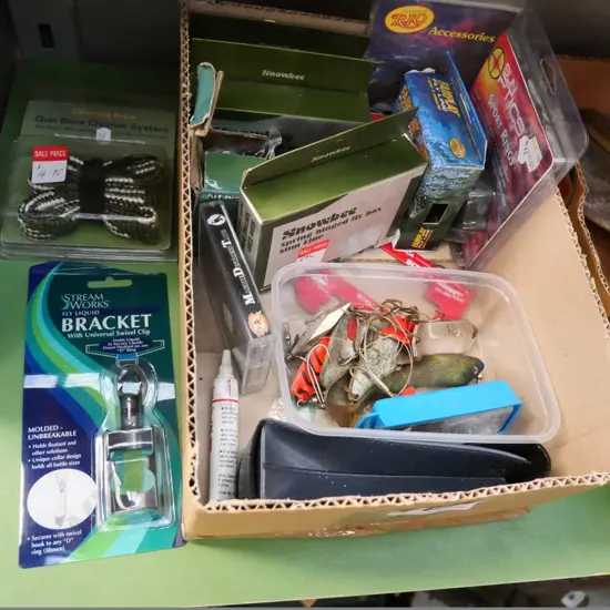 box of hunting and fishing accessories