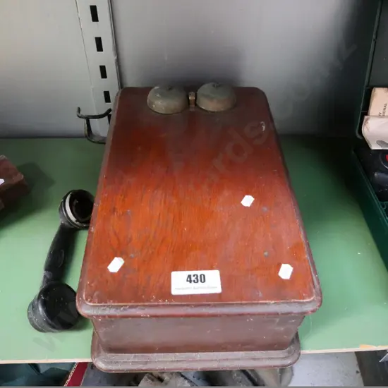 part vintage wall-mount wood-cased telephone