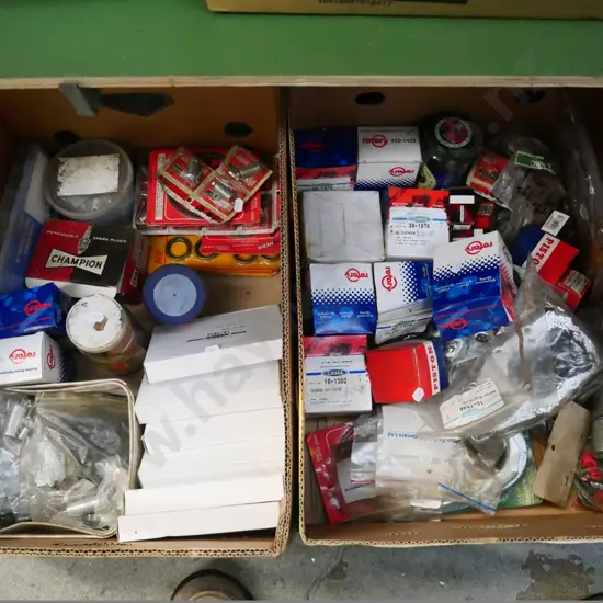 2 boxes of lawnmower accessories - blue dots