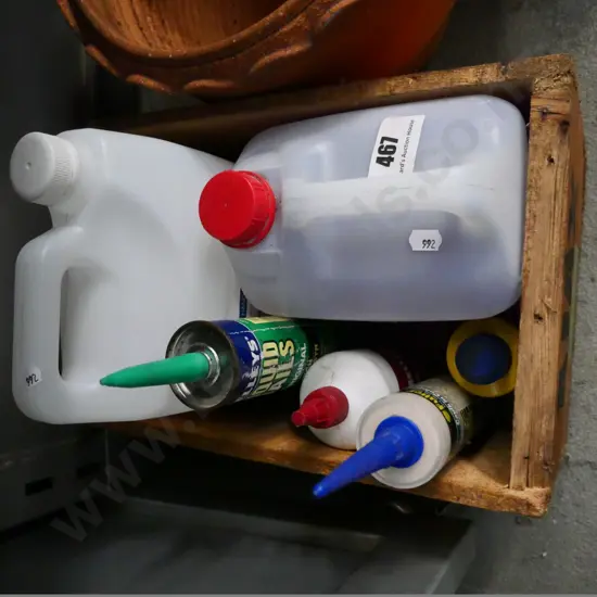 wooden box of cleaner, meths, liquid nails, etc.