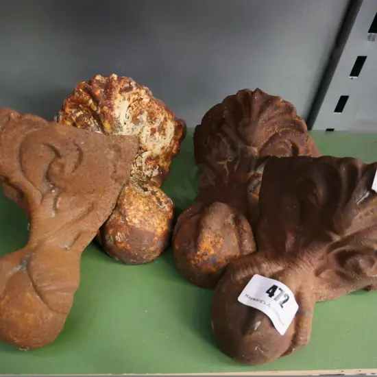 4 matching cast iron claw and ball bath feet