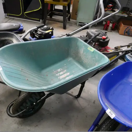 green plastic wheelbarrow
