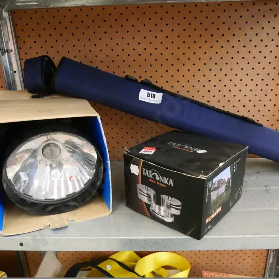 fly fishing rod, 12v lamp, and a camping cook set