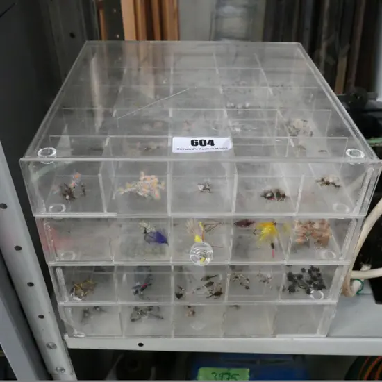 set of small perspex drawers and numerous fly fishing lures