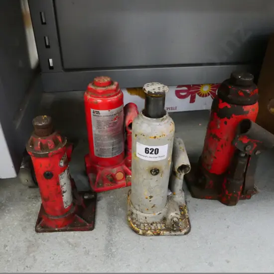 4 vintage bottle jacks