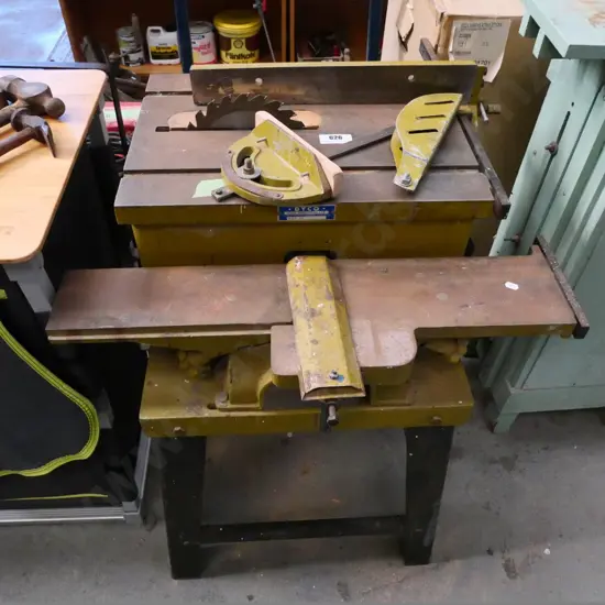 Dyco combination buzzer/borer/table saw