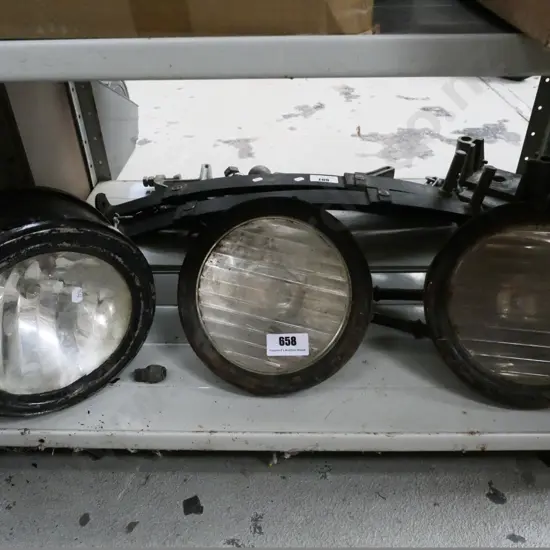 3 vintage automobile headlights