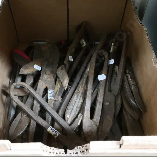 box of rusty tin-snips