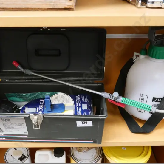 4l garden sprayer and a toolbox with contents