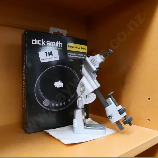 CD player and a drill grinding attachment