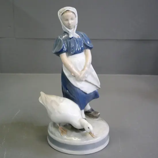 Royal Copenhagen figurine - girl with goose No. 527. H-230