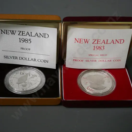 2 cased New Zealand silver dollars - 1983 Royal Visit & 1985 black stilt