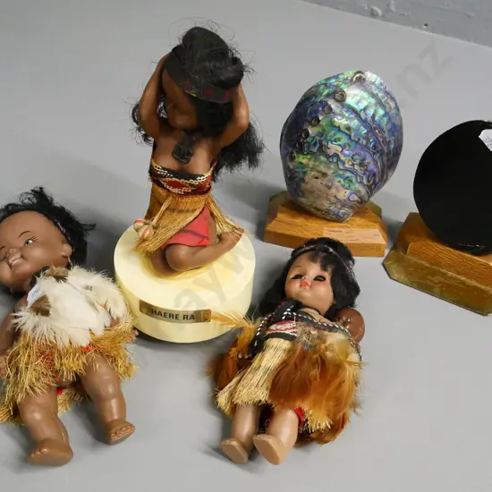 New Zealand souvenir ware - pair of paua shell and wood book-ends and 3 dolls, one is a musical wind-up H-210
